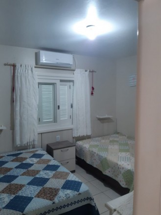 CASA NA PRAIA REAL - 3 dormitórios com suíte UMA QUADRA DO MAR Praia Real - Torres - RS